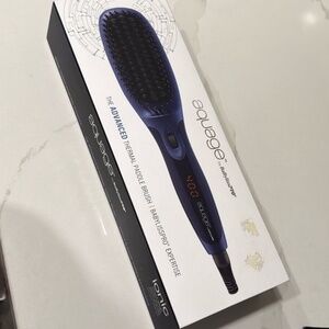 Thermal paddle brush